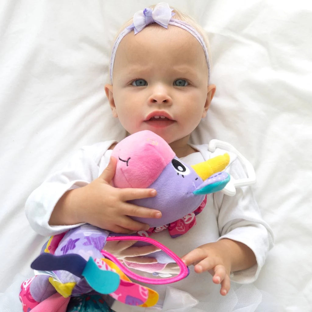 Playgro Activity Friend Stella Unicorn – Đồ chơi phát triển cảm giác cho bé, kẹp gắn xe đẩy/ghế ngồi, từ 0 tháng